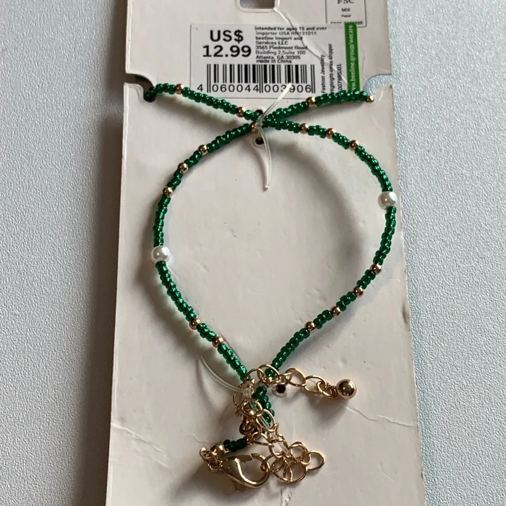 Sweet little Christmas bear necklace with red heart belly.